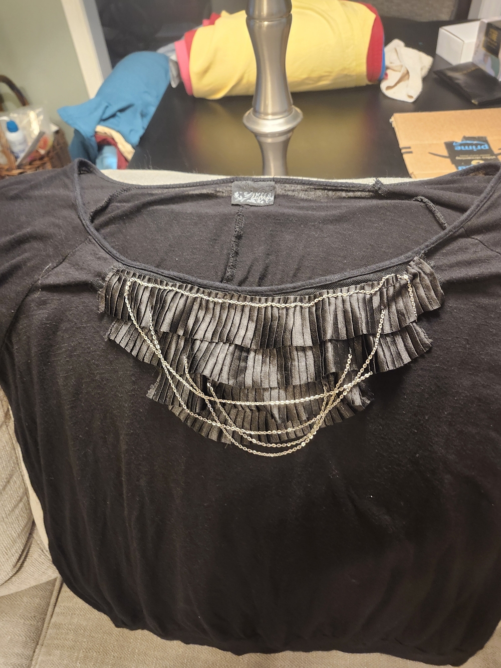 Daytrip Black Short Sleeve Top with Fringed Bib and Silver Chains